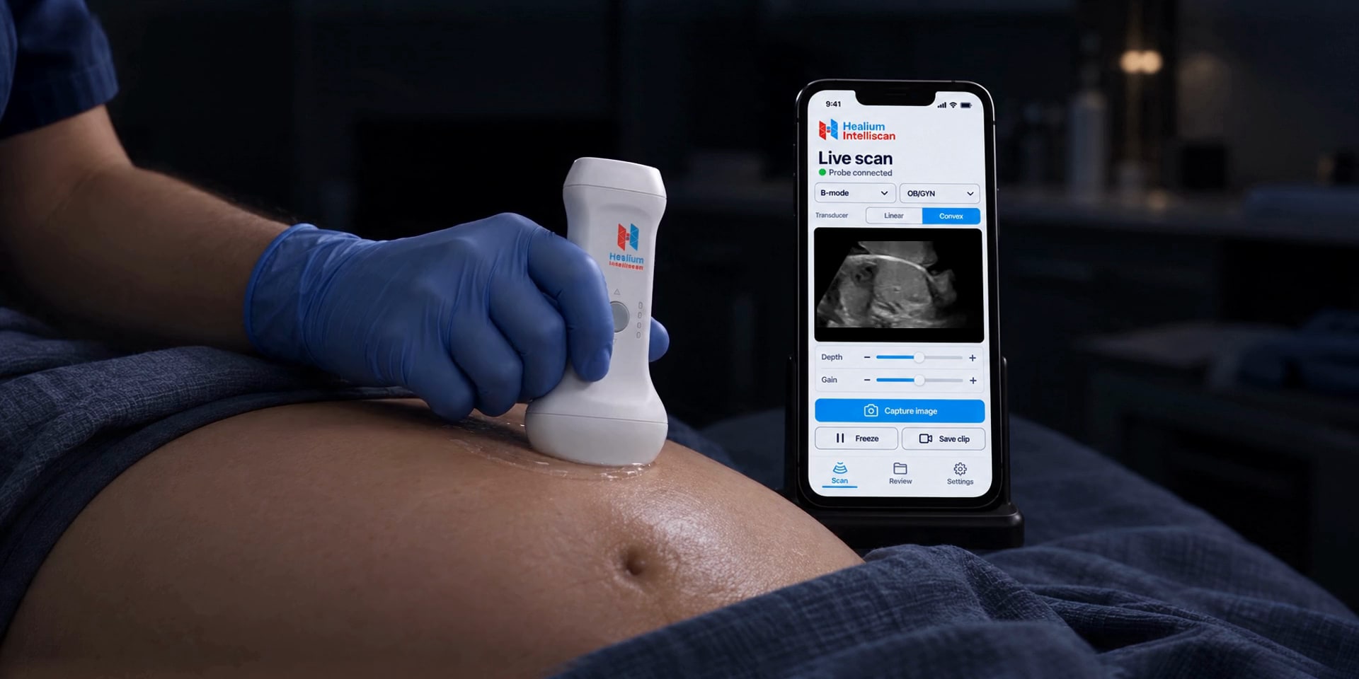 Healium Intelliscan probe scanning a patient, with the live ultrasound image on a phone